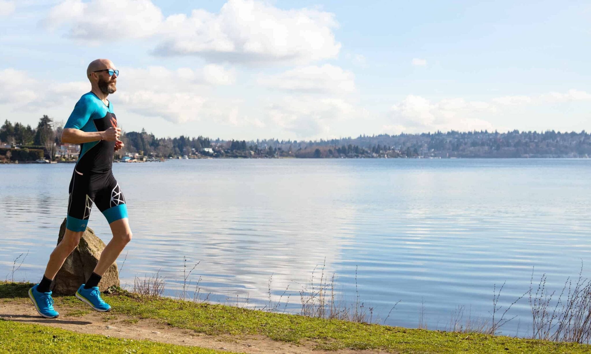 Chris Johnson running along a lake